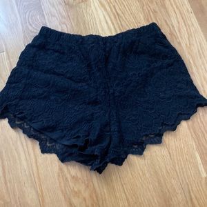 Black lacy shorts. Divided size XS.